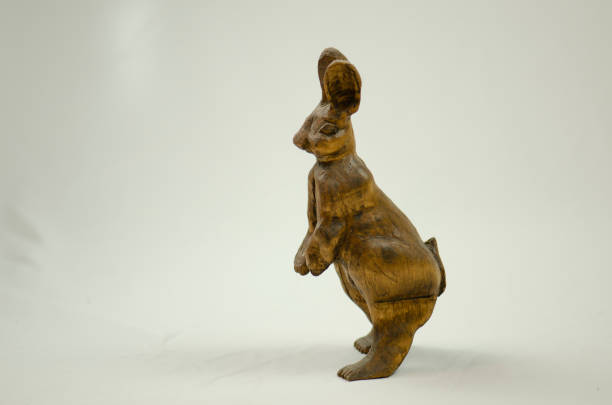 istock Wood carving of Rabbit on white 1295855786