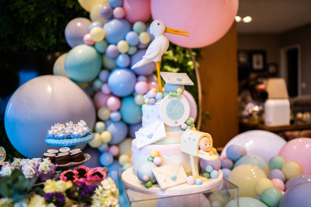 mesa decorada para festa de revelação de gênero - balão enfeite - fotografias e filmes do acervo