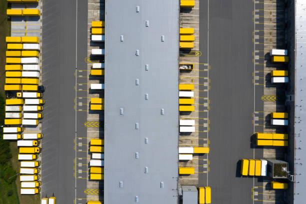 istock Aerial View of Cargo Containers and Distribution Warehouse 1295856239