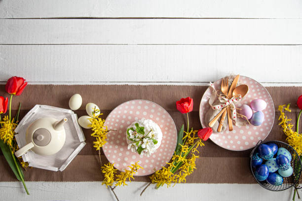 istock Top view setting the festive table for the Easter holiday. 1295857237