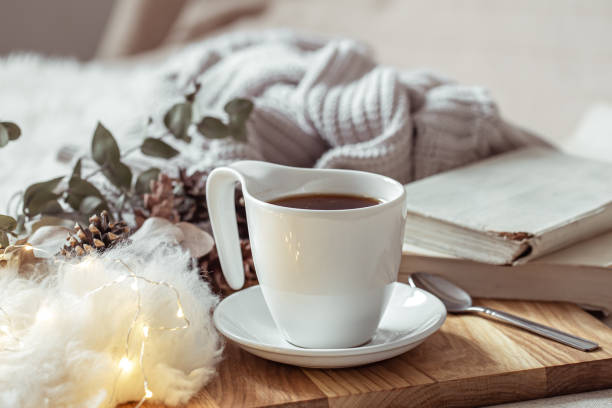 istock Composition with white cup and saucer close up. 1295857944