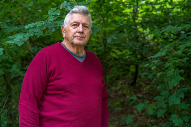 istock Active senior man in countryside portrait 1295863546