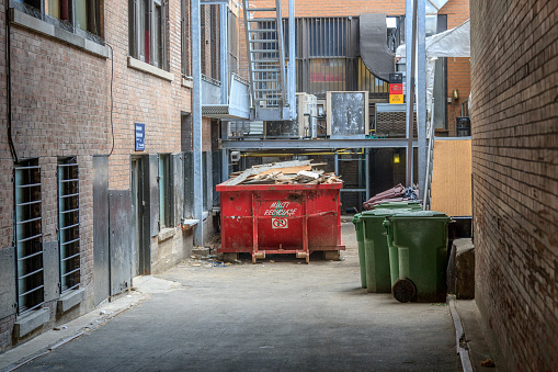 Garbage containers in back alley