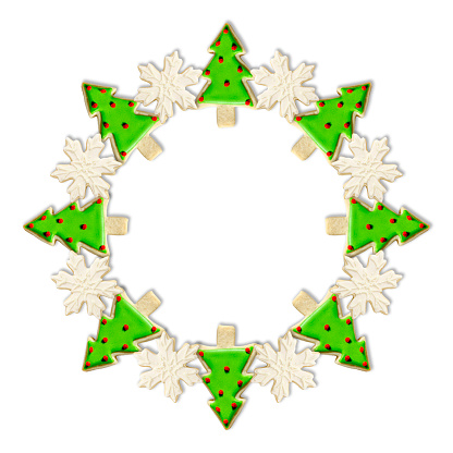 Christmas Tree and Snowflake: A Christmas Wreath has been created using festive decoratively iced Christmas Cookies
