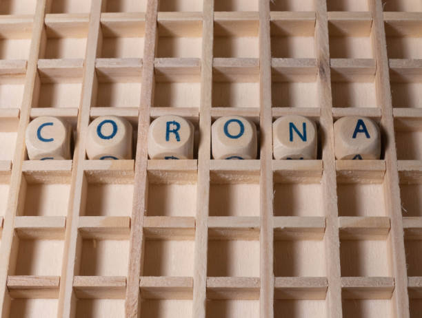 istock Wooden Letters with Text Corona 1295865493