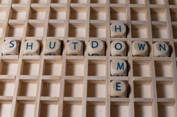 istock Wooden Letters Text Shutdown Home 1295865562