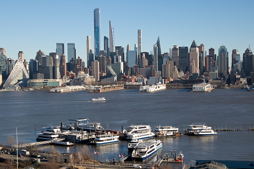 Weehawken New Jersey, USA - January 07, 2021: NY Waterway ferries at Weehawken Terminal located on the Hudson River for service to Manhattan.