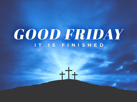 Good Friday - It Is Finished Typography Holiday Text Over Dark Blue Clouds in Sky Background and Three Christian Easter Crosses on the Hill of Calvary where Jesus Christ was Crucified