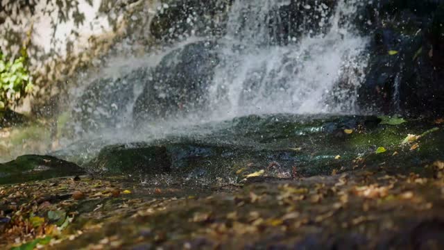 Drops falling on the ground,beautiful waterfall, water splashes,texture of drops,rain video wallpaper