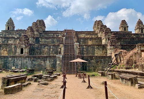 Angkor, Cambodia - January 24, 2020: Phnom Bakheng is a Hindu temple dedicated to Shiva, it was built at the end of the 9th century, during the reign of King Yasovarman.