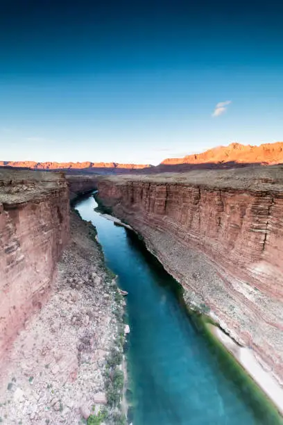 Photo of Colorado river passes through the arid desert near Nabajo bridge, AZ