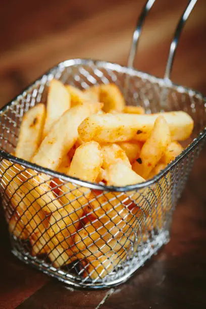 Photo of Spicy French fries in shopping cart.