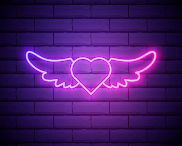 istock Heart with Wings purple glowing neon ui ux icon. Glowing sign logo vector. 1295882976
