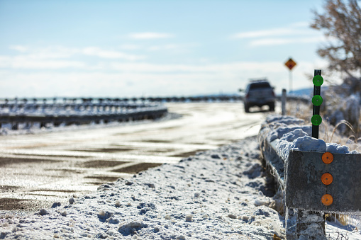 Early Morning After Snowfall Rural Highway and Guardrail in Winter in Western USA Photo Series Matching 4K Video Available (Shot with Canon 5DS 50.6mp photos professionally retouched - Lightroom / Photoshop - original size 5792 x 8688 downsampled as needed for clarity and select focus used for dramatic effect)