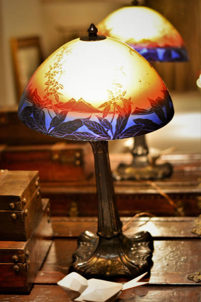 istock A beautiful lamp with glass dome drawn on the table 1295885861