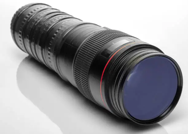 Photo of Big macro lens on a white background.