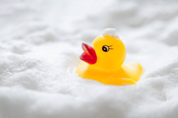 istock Duck toys and bubbles. Bathing image. 1295893744