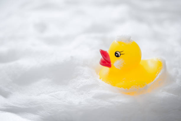 istock Duck toys and bubbles. Bathing image. 1295893768