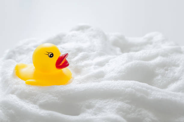 istock Duck toys and bubbles. Bathing image. 1295893783