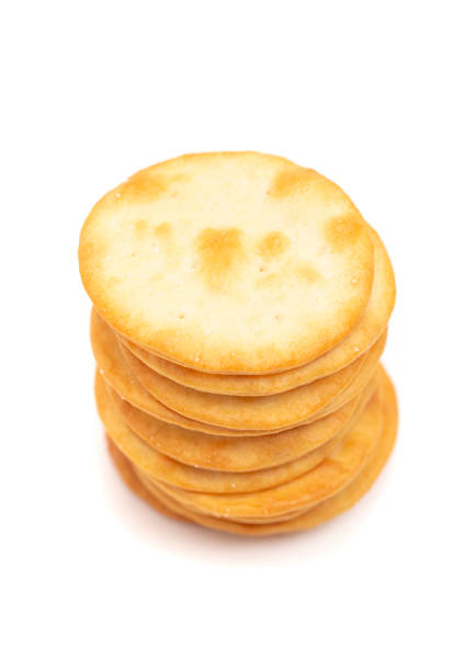 istock Golden Baked Pita Crackers Isolated on a White Background 1295896745