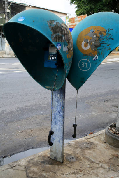 salvador, bahia, brazil - january 8, 2021: defective public telephone is seen in Cabula neighborhood in the city of Salvador.