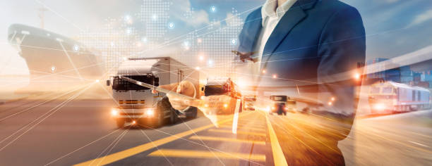 istock Businessman using tablet on logistic network distribution and smart transportation and networking intelligent logistics of truck and train container cargo ship, Logistic import export and industry. 1295897671