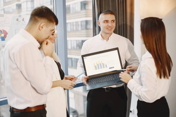 istock Young team working together and use the laptop 1295900892