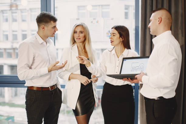 istock Young team working together and use the laptop 1295900904
