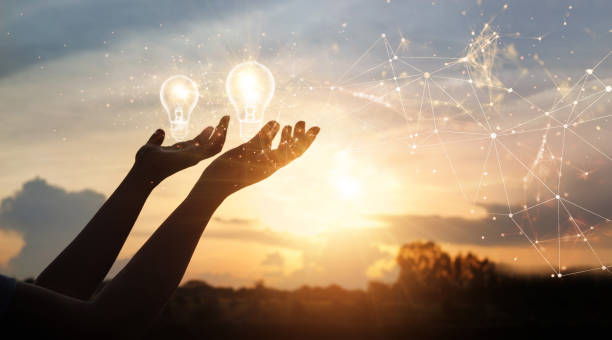 istock Innovative idea. Inspiration and network. Hands holding light bulbs as symbol of innovation on global network connection. Creativity on  connectivity. 1295903671