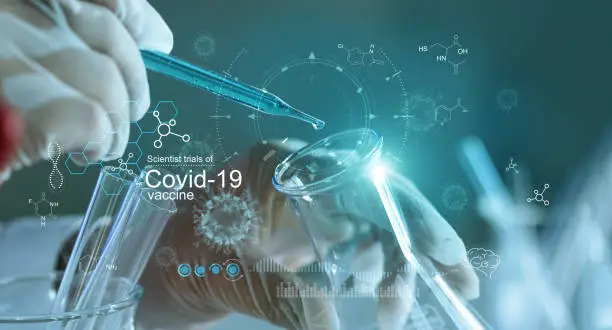 Photo of Scientist testing samplings on petri dish analyzing experimental research to develop covid-19 coronavirus vaccine in laboratory. Global healthcare and medical innovative technology concept.