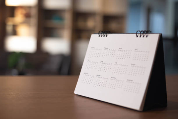 Calendar Event Planner is busy.calendar,clock to set timetable organize schedule,planning for business meeting or travel planning concept. stock photo
