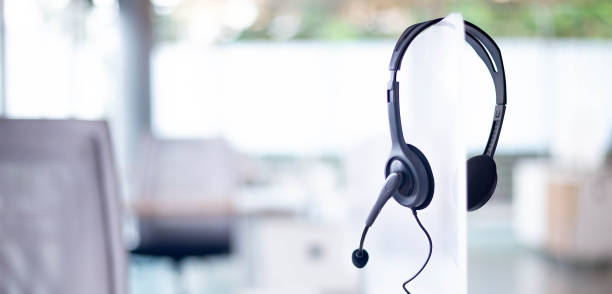 istock Communication support, call center and customer service help desk. VOIP headset for customer service support (call center) concept 1295906392