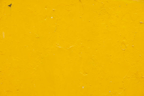 istock Orange painted aged, grunge wall texture, background 1295910789