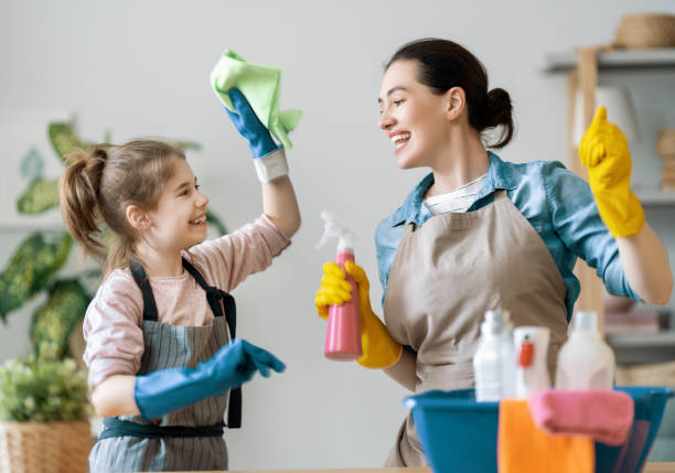 istock family cleaning the room 1295913567