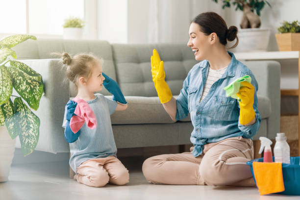 istock family cleaning the room 1295913667