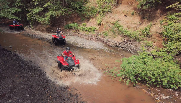 istock Driving 4x4 vehicles drone point of view 1295914705