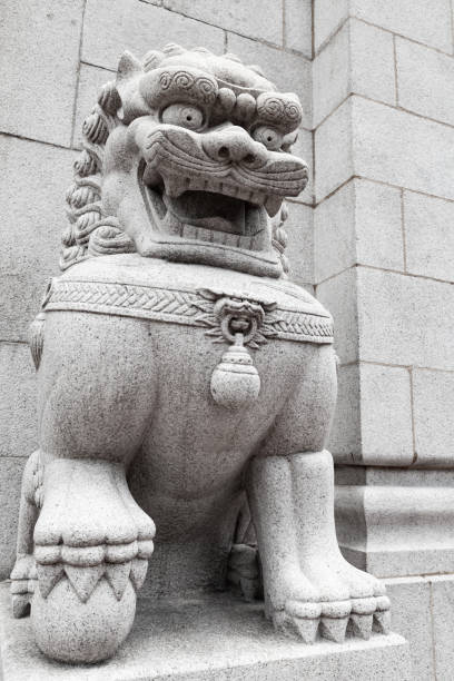 istock Traditional white Chinese lion statue 1295915752