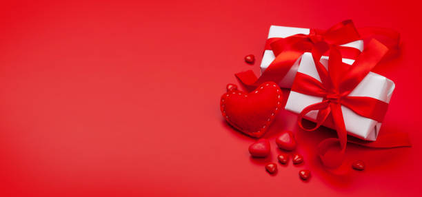 istock Valentines day. Gift boxes, heart decor and candy sweets 1295916667