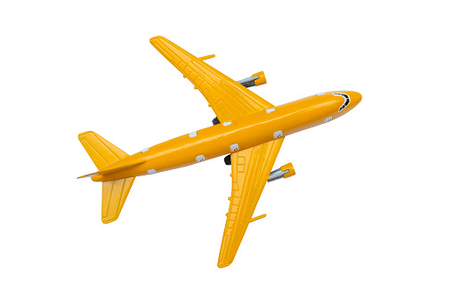 Yellow plane model, isolated white background