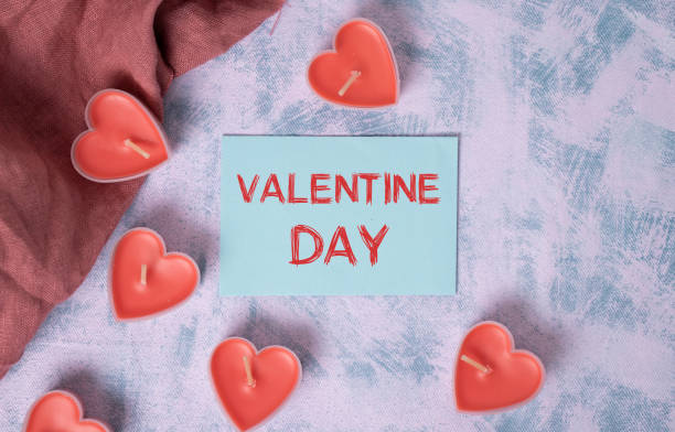 istock Valentines day message on paper with pink hearts 1295921296
