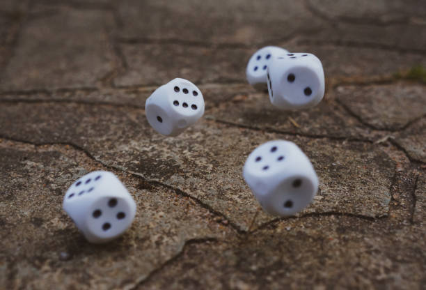 istock Let's play a dice game for money 1295921469