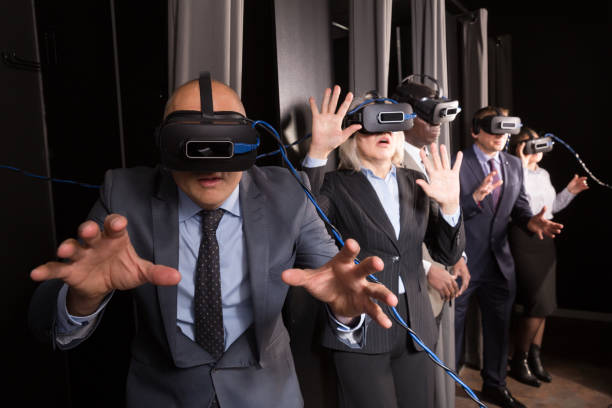 istock Man wearing virtual reality glasses 1295923269
