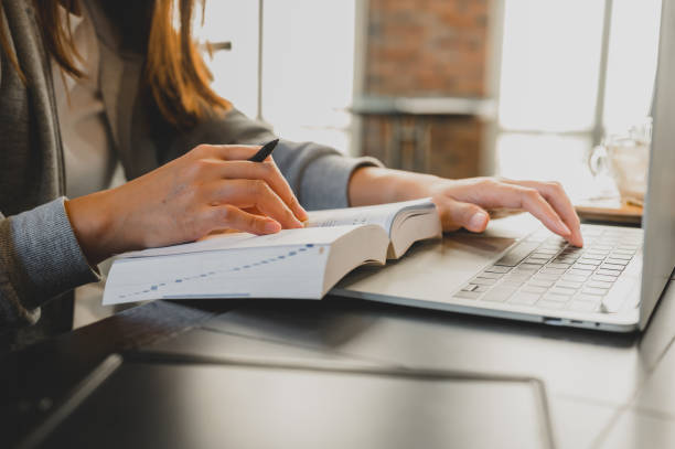 istock Asian student online learning and education at home. Social Distancing and New normal lifestyle after Covid-19. 1295926362