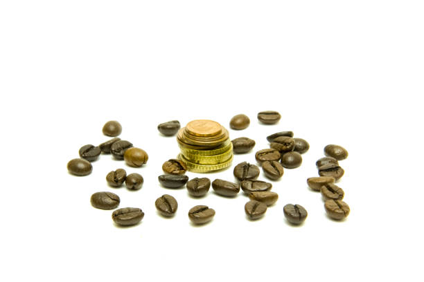 istock Coffee beans and money. 1295928983