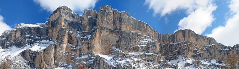 The cable car station on Birg (2684m) on its dramatic rocky summit location overlooked by the iconic north face of the Eiger (3970m) and Jungfrau (4158m) high in the Alps, Switzerland.