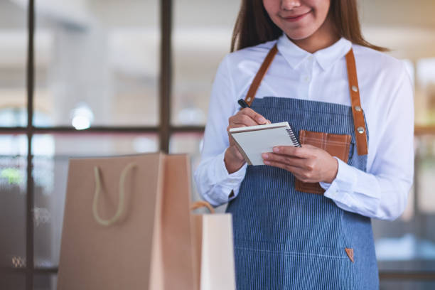 istock A young female entrepreneur checking orders from customer 1295933918