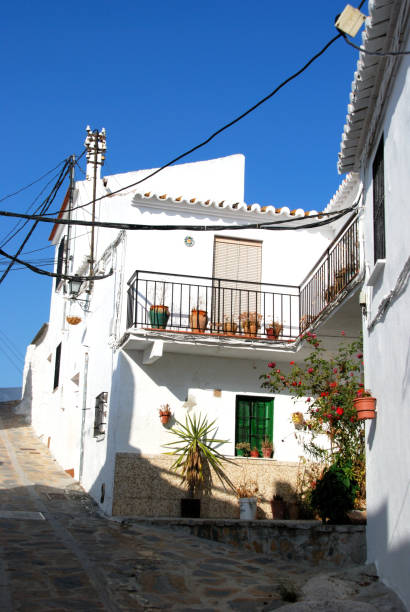 istock Traditional village street, Comares, Spain. 1295936340