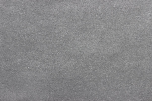 istock Texture of rough gray paper with spots 1295936807