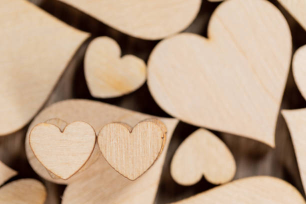 istock Wooden hearts background 1295936932