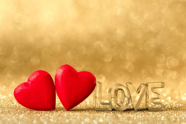 istock Wooden hearts and word love 1295936934